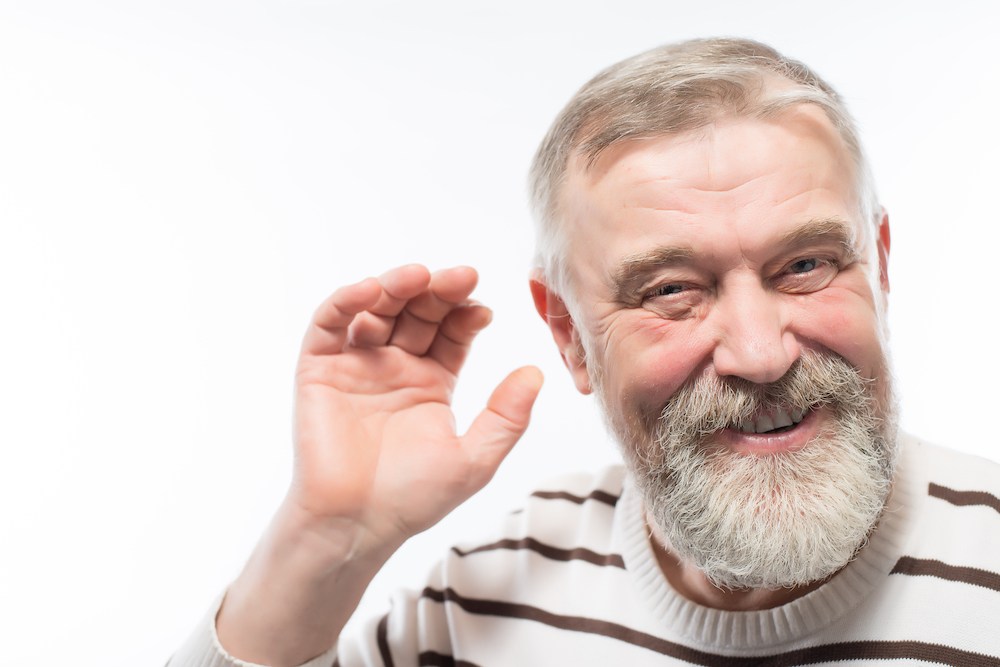 senior gentleman with hearing loss issues optimized